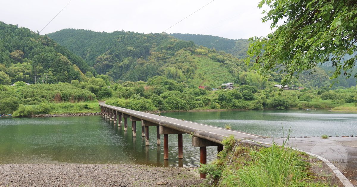 A long low bridge over a calm river in Kochi Prefecture, Japan
