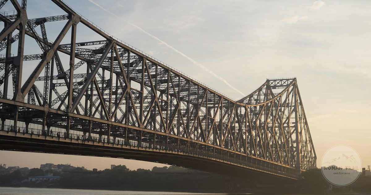 The Howrah Bridge over the Hooghly river at sunrise in Kolkata, Kolkata packing list for women by Roman Trail Outfitters