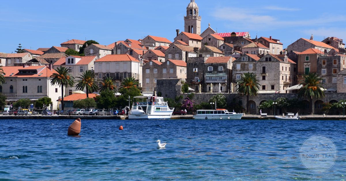 The historic buildings of Korcula beside the Adriatic with boats, Croatia