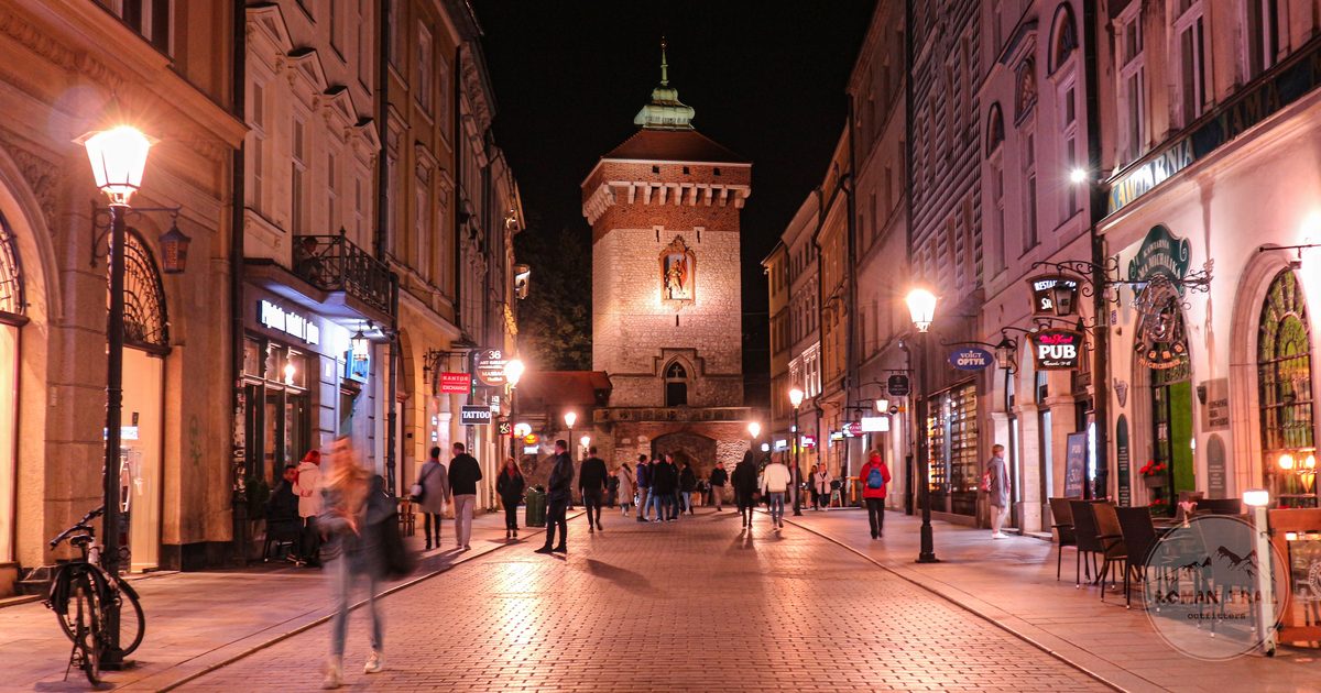 St Florian's Gate and the evening street scene in Krakow, Poland