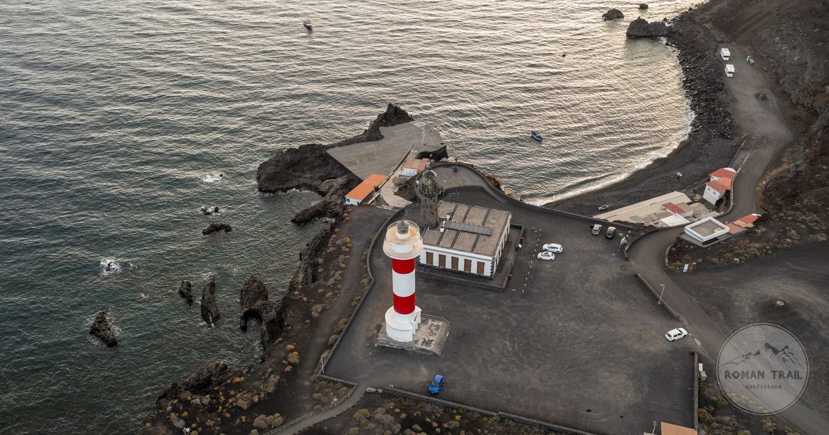 Fuencaliente Lighthouse on the rocky coast of La Palma at dusk, Canary Islands