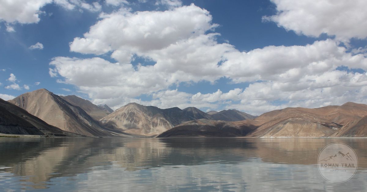 A high mountain lake reflecting the sky in Ladakh, India