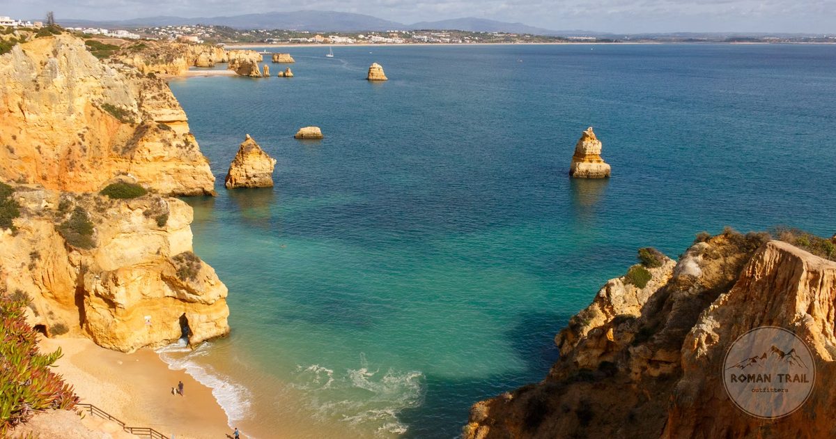 Aerial view of Praia do Camilo and its golden cliffs at Lagos, Portugal