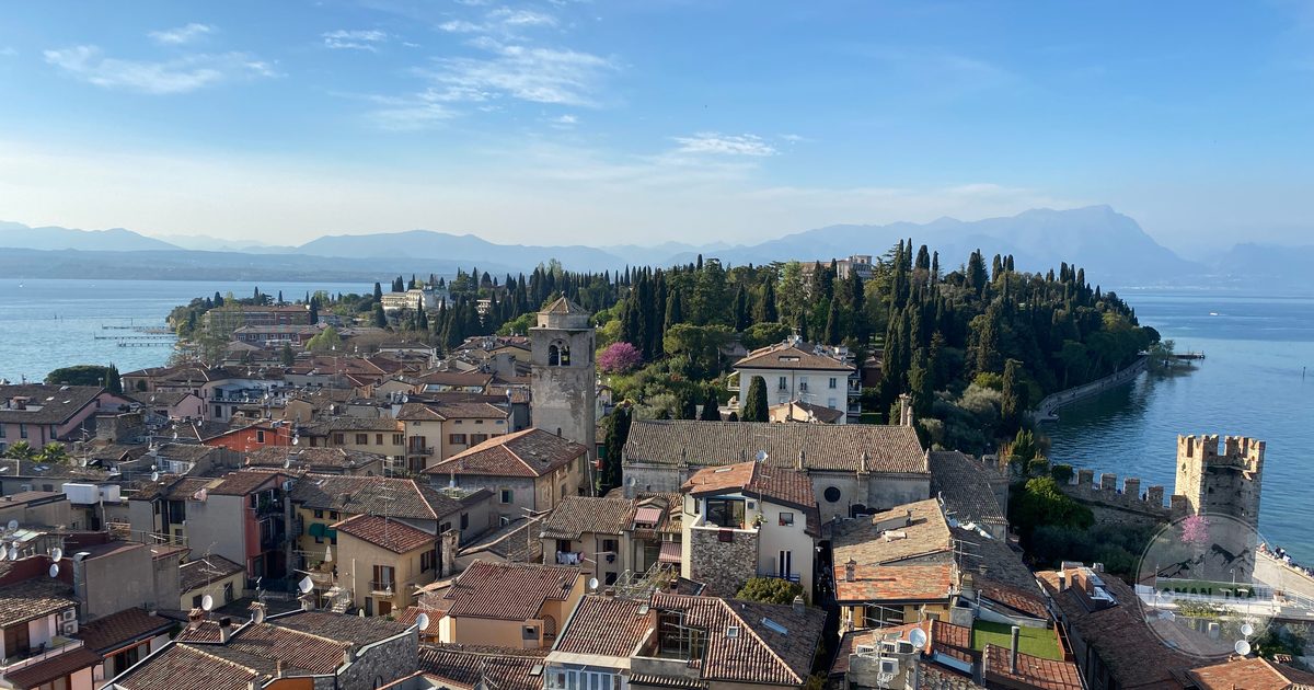 The old town of Sirmione on its peninsula in Lake Garda, Lake Garda packing list for women by Roman Trail Outfitters