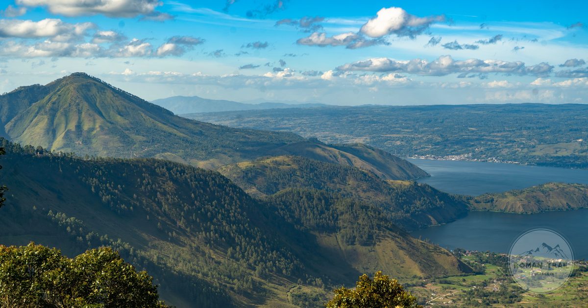 Aerial view of Lake Toba surrounded by mountains, North Sumatra, Indonesia