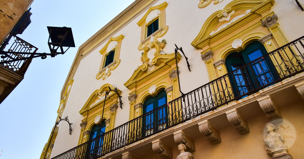 A baroque building with intricate carving in Lecce, Apulia, Italy