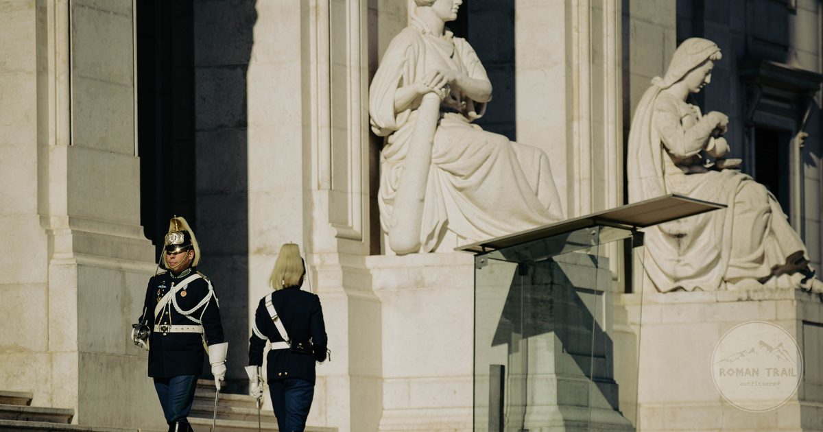 Guards in historic uniform at a Lisbon landmark, Portugal