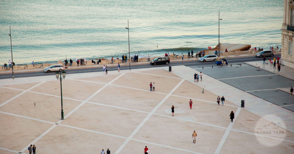 A large public square beside the river in Lisbon, Portugal