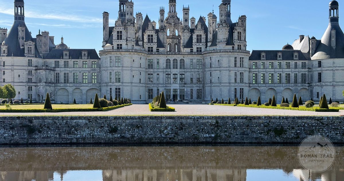 The Chateau de Chambord mirrored in still water, France