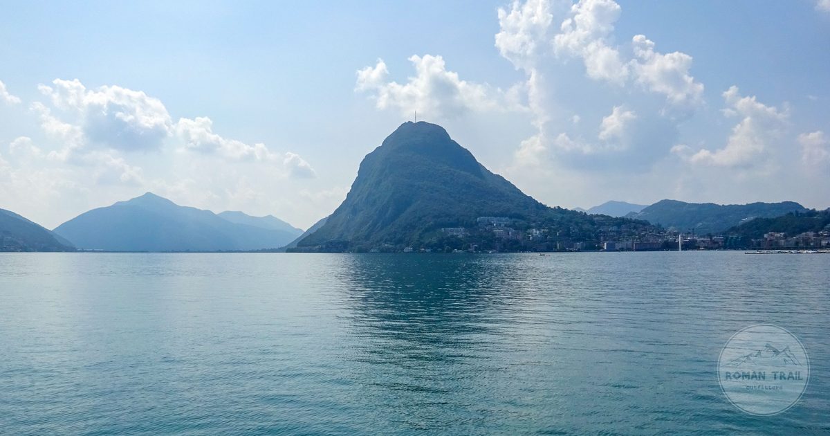 Lake Lugano and Monte Bre under a clear sky, Ticino, Switzerland