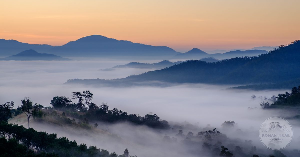 Aerial view of the Mae Hong Son mountains in mist at sunrise, Thailand