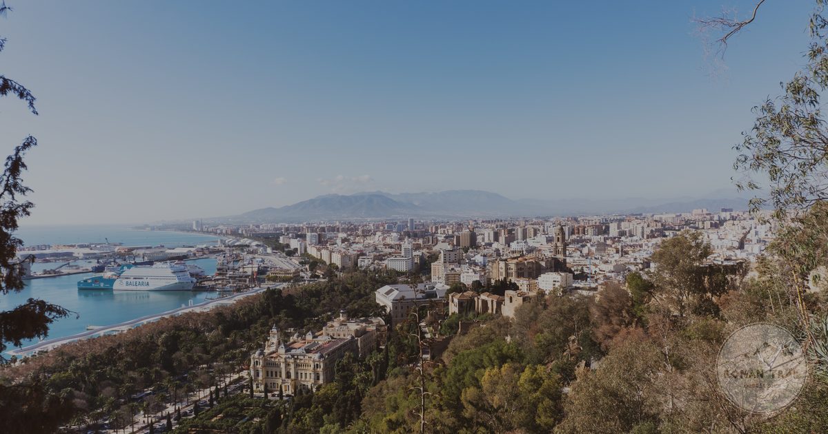The harbour and green parkland along the Malaga waterfront, Malaga packing list for women by Roman Trail Outfitters