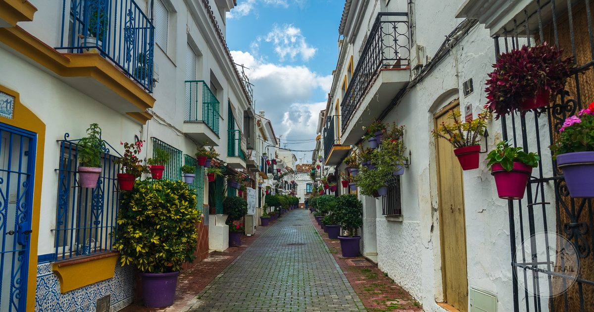 A flower filled alley in the old town of Marbella, Andalusia, Spain