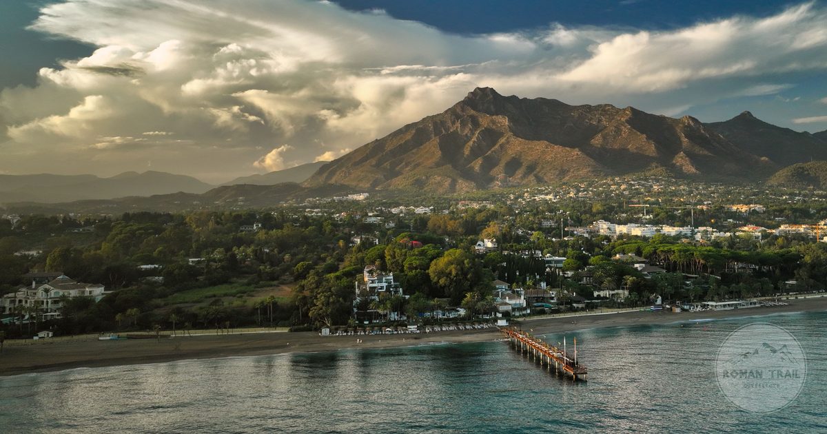 Aerial view of the Marbella coastline with mountains behind, Spain