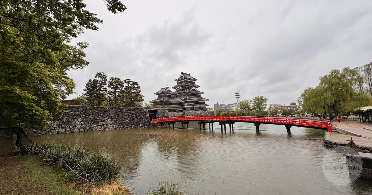 Matsumoto Castle and its red bridge in spring, Nagano, Japan