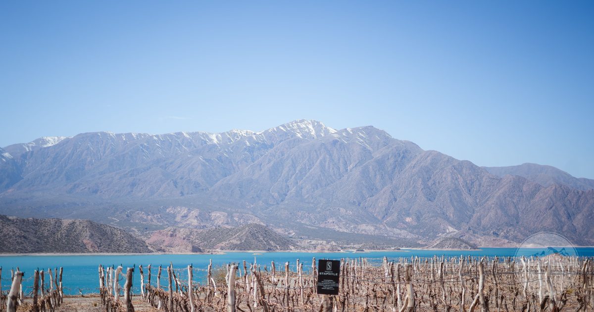 Andes mountains above a lake at Potrerillos near Mendoza, Mendoza packing list for women by Roman Trail Outfitters