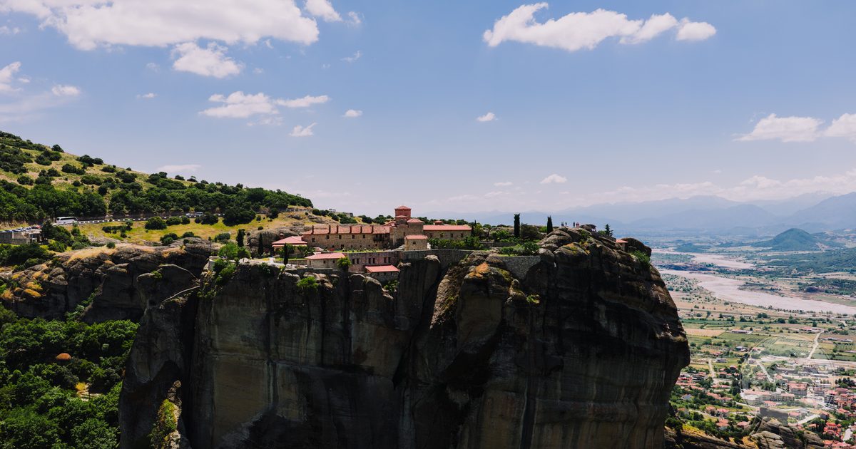 A cliff-top monastery at Meteora seen from above, Greece
