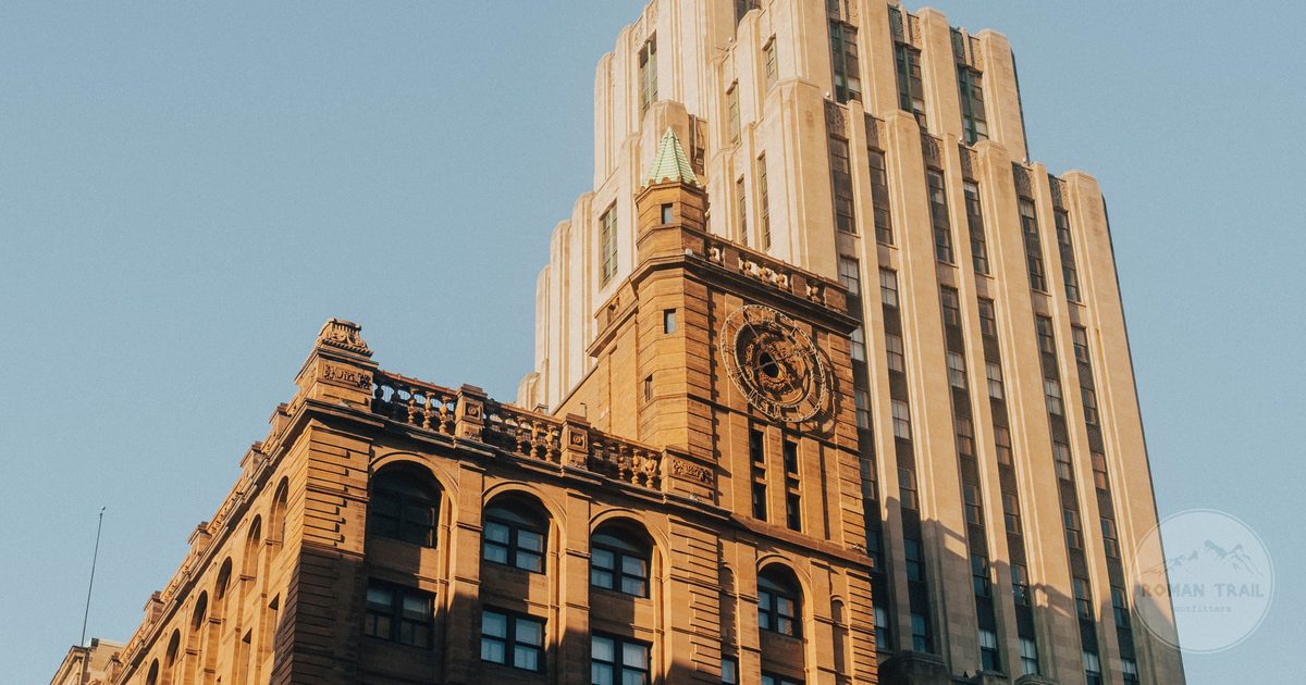Art deco tower among downtown Montreal architecture in golden light, Montreal for women travelers