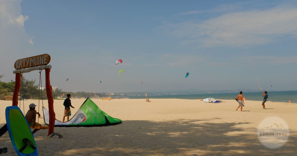 Kitesurfing on a sunny day at Mui Ne beach, Vietnam