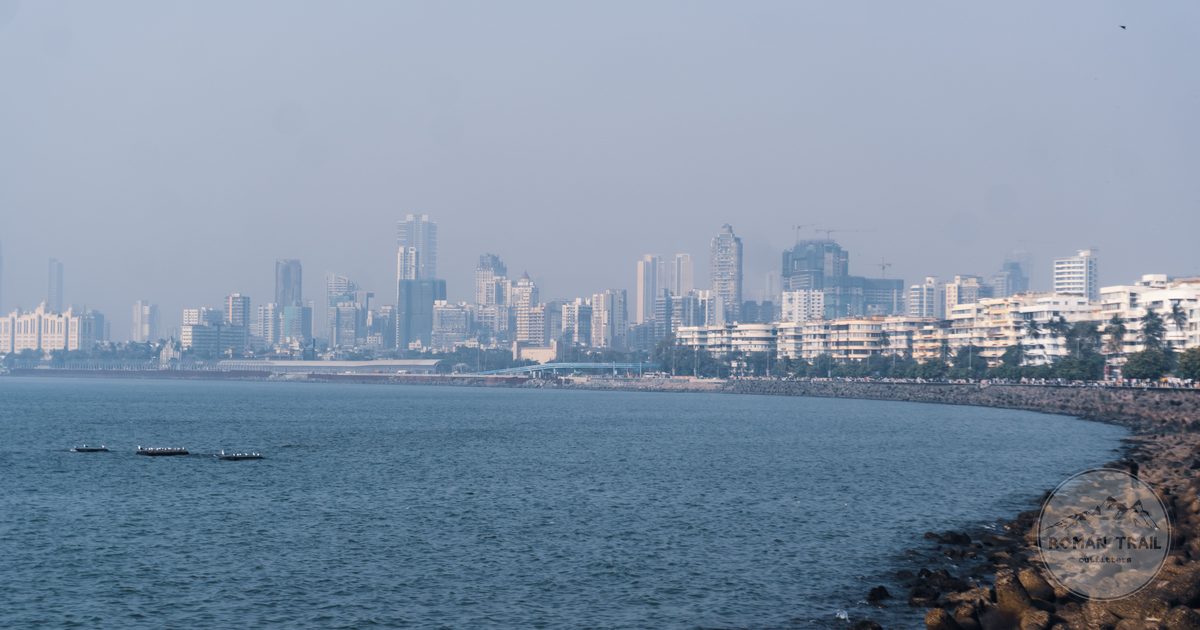The curve of Marine Drive and the Mumbai skyline above the Arabian Sea, Mumbai packing list for women by Roman Trail Outfitters