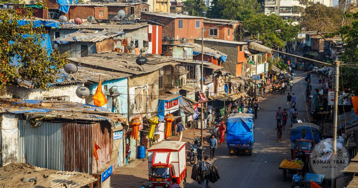 A busy Mumbai street scene with market stalls and daily city life, Mumbai packing list for women by Roman Trail Outfitters