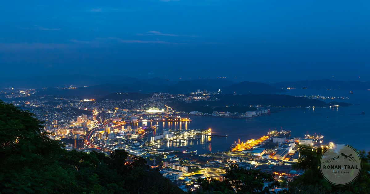 Nagasaki harbour and the illuminated cityscape in the evening, Japan