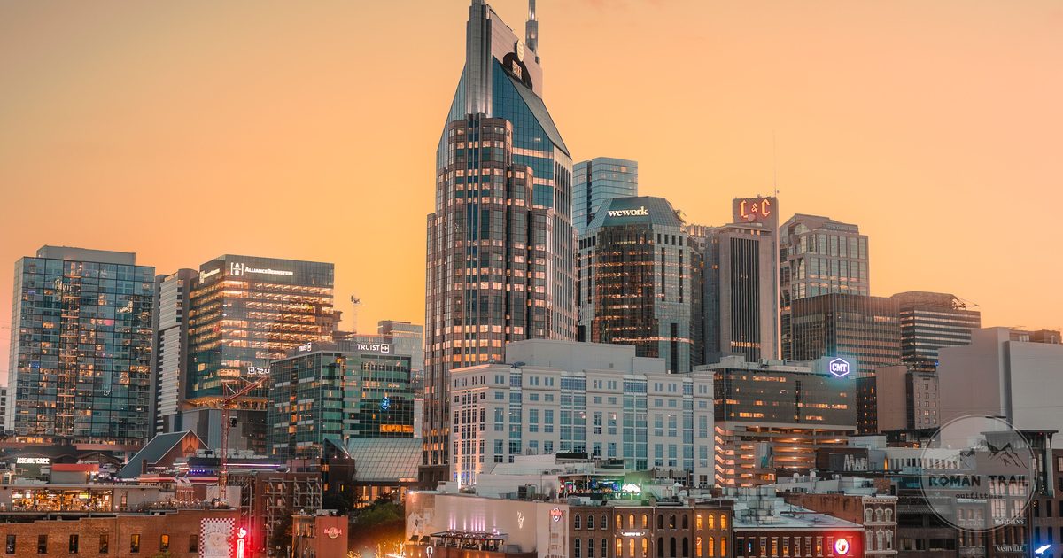 Downtown Nashville skyline at golden hour, Nashville travel guide for women by Roman Trail Outfitters