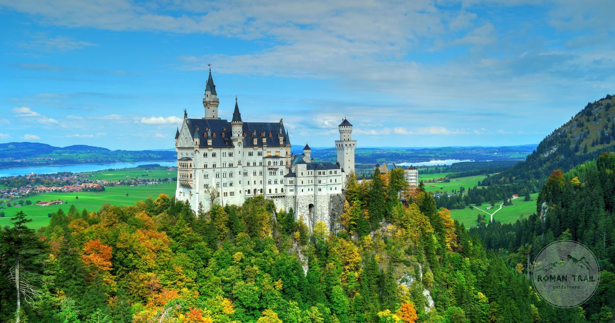 Aerial view of Neuschwanstein Castle amid autumn foliage, Bavaria Germany