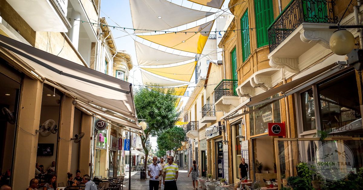 A busy street of cafés and shops in Nicosia, Cyprus