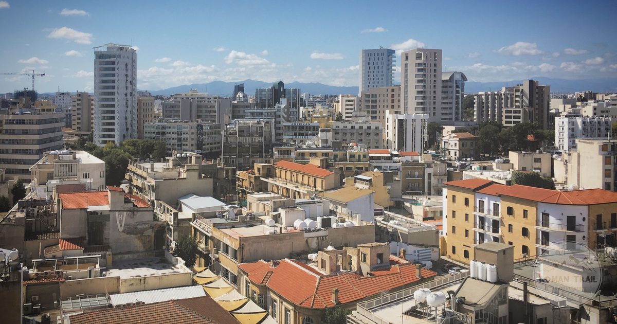The skyline of Nicosia, Cyprus, under a clear blue sky