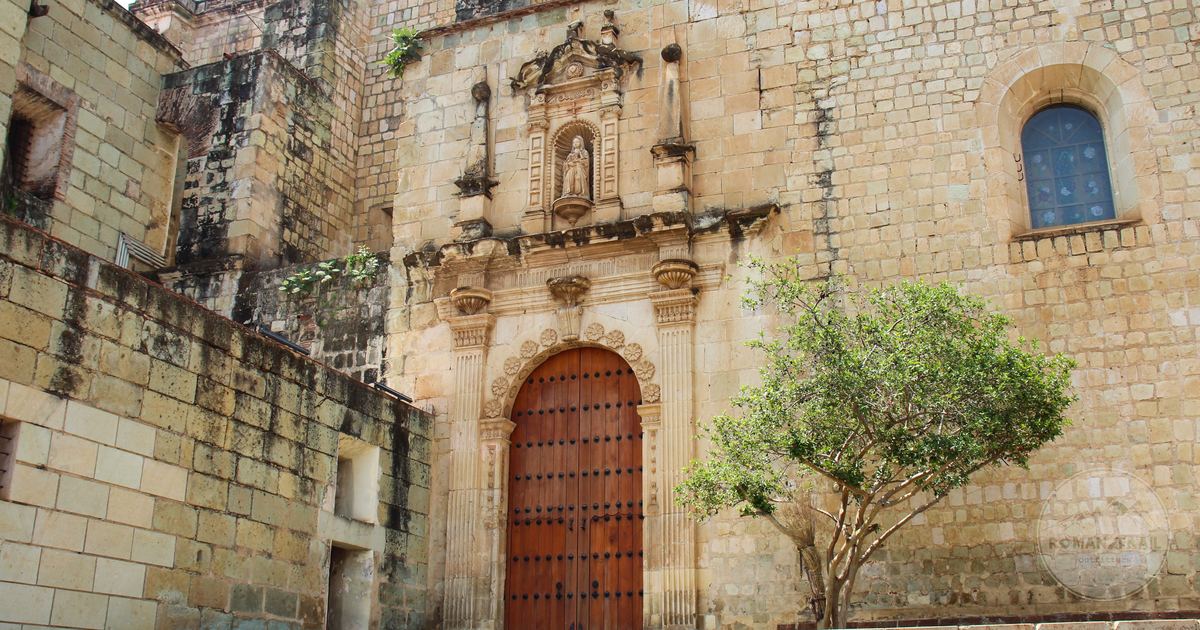 Colonial architecture with a carved stone doorway in Oaxaca, Mexico