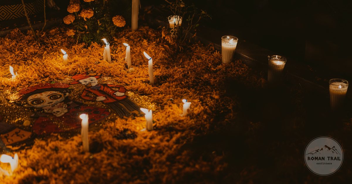 A Day of the Dead altar with candles and marigolds in Oaxaca, Mexico