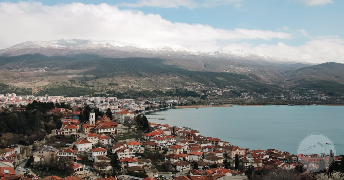 Aerial view of Ohrid town above Lake Ohrid with mountains behind, North Macedonia