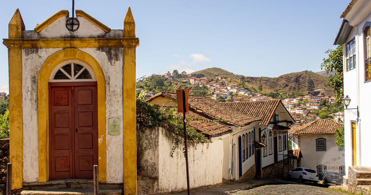 A cobbled street lined with colonial buildings in Ouro Preto, Brazil