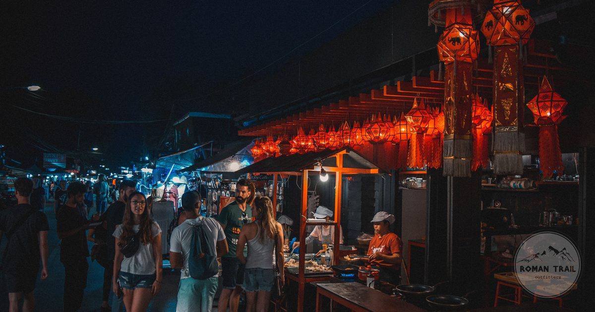 The Pai night market busy with visitors and local vendors, Thailand