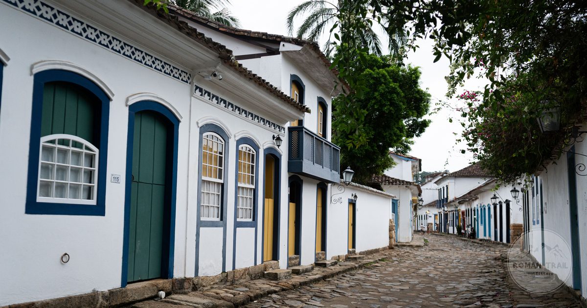 A cobblestone street lined with colonial architecture in Paraty, Brazil