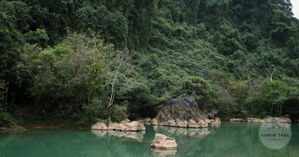 A jungle lake with rock reflections in Quang Binh province, Vietnam
