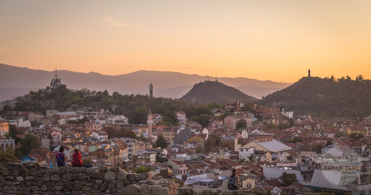Sunset over Plovdiv, Bulgaria, with ancient ruins and distant hills