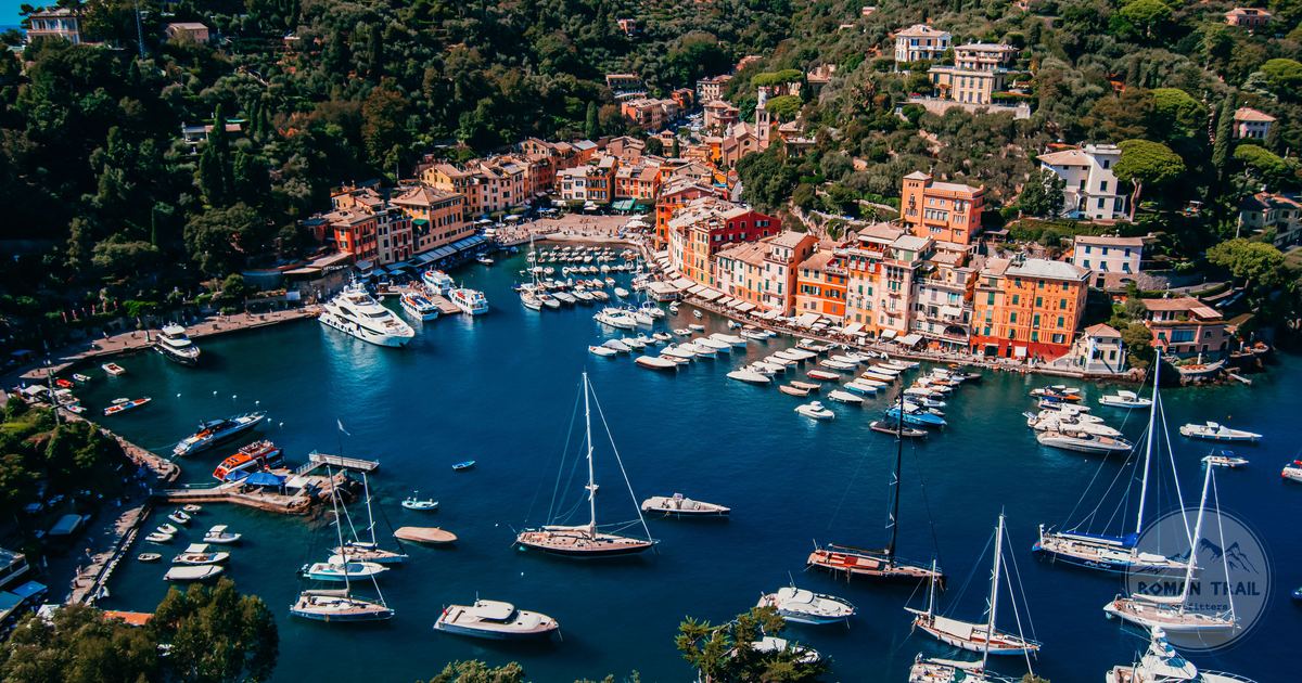 Aerial view of Portofino harbour with yachts and coloured buildings, Italy