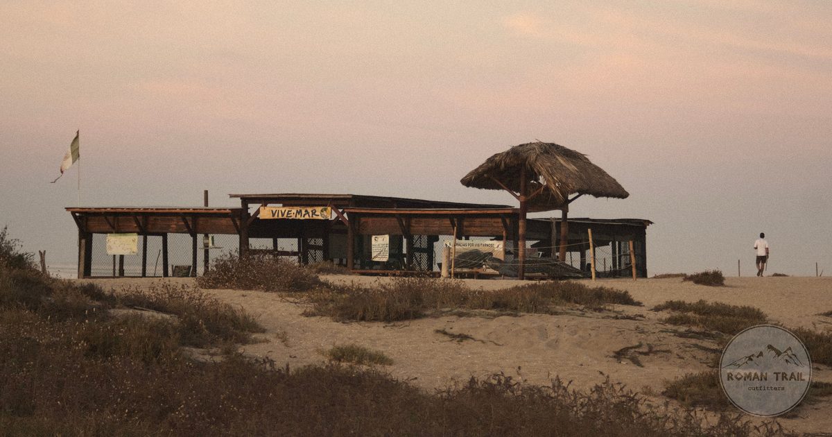 A beach hut among dunes at dusk at Puerto Escondido, Mexico