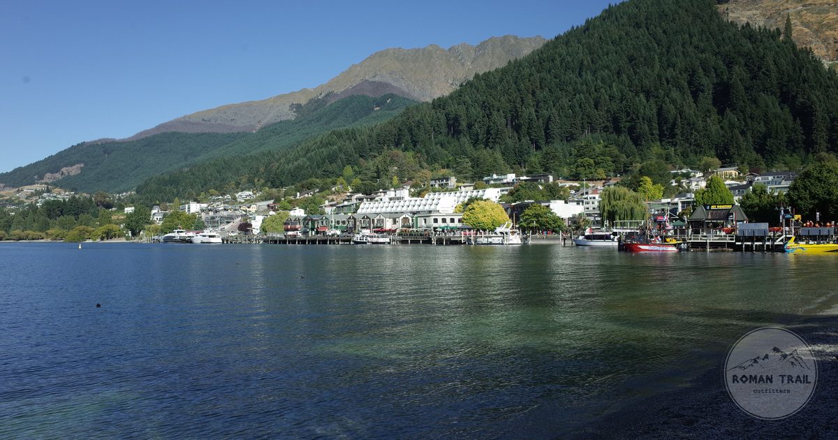 The Queenstown waterfront with green mountains behind, New Zealand