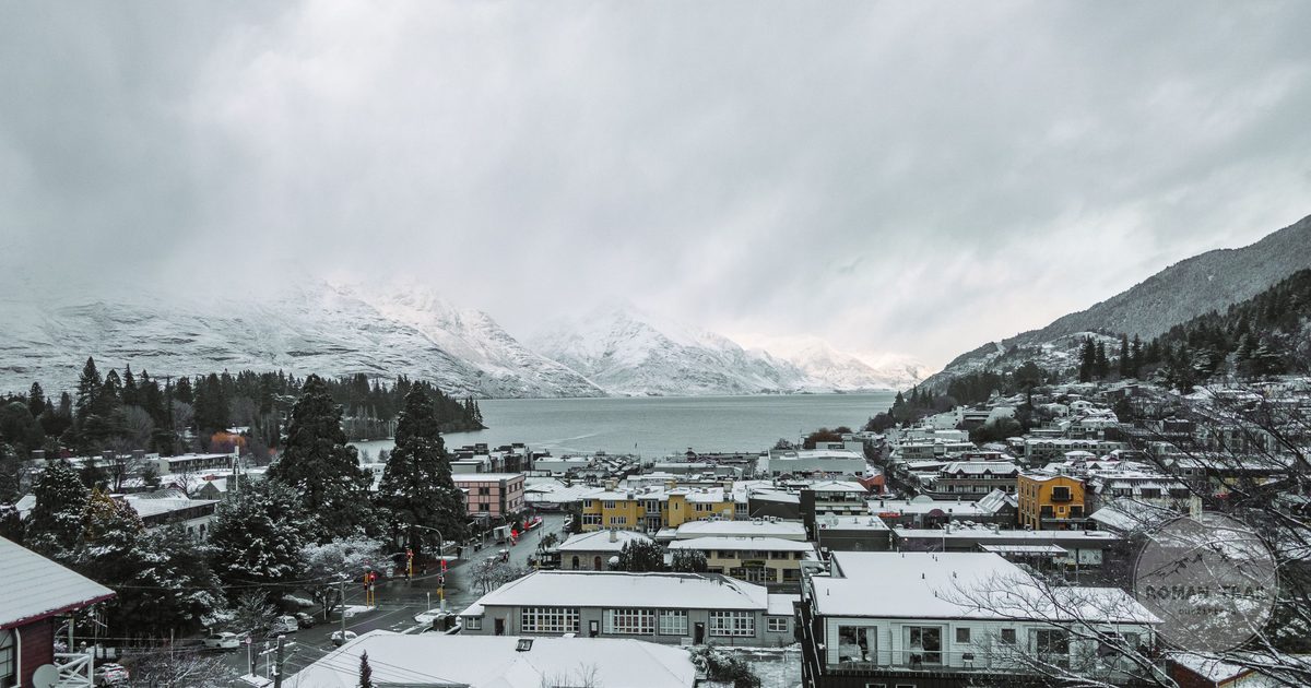 Aerial winter view of Queenstown, New Zealand, under snow