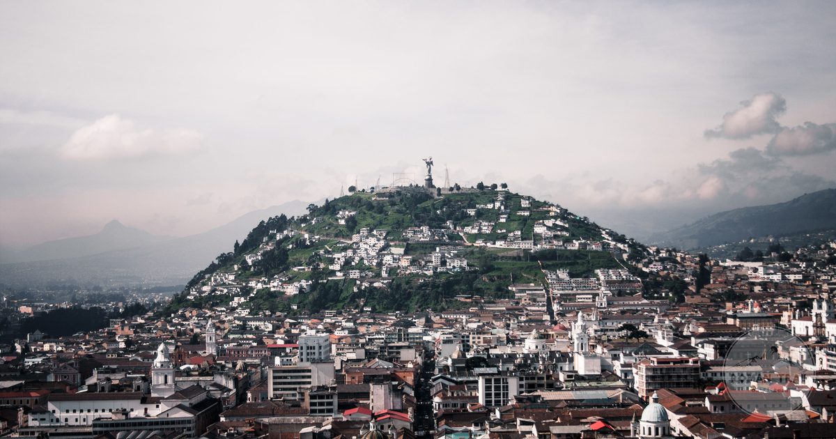 Aerial view of Quito with El Panecillo hill and the Virgin statue above the city, Quito packing list for women by Roman Trail Outfitters