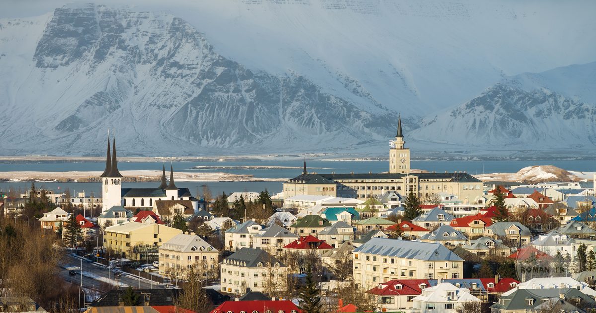 Reykjavik in winter with snow-capped mountains behind, Iceland