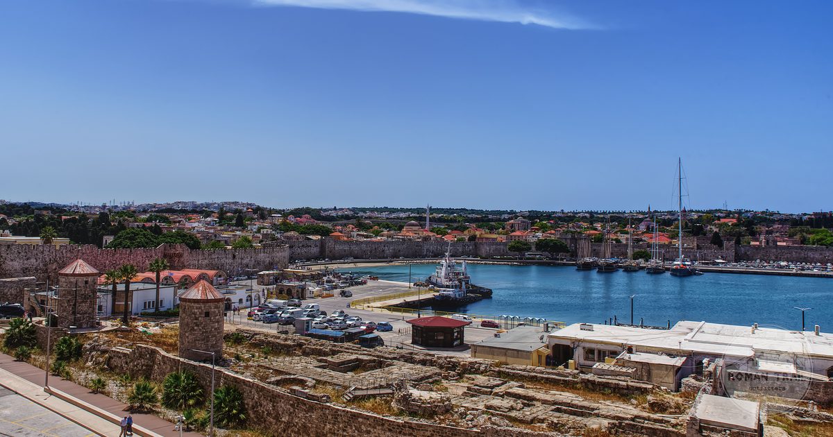 Aerial view of Rhodes Town harbour and its medieval walls, Greece