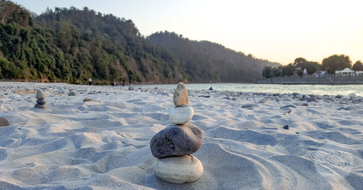 Stacked stones on the Ganges riverbank at Rishikesh, India