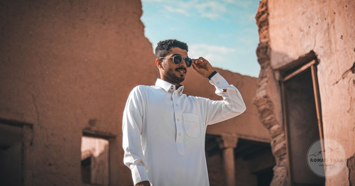 A visitor among ancient mudbrick ruins in Riyadh, Saudi Arabia