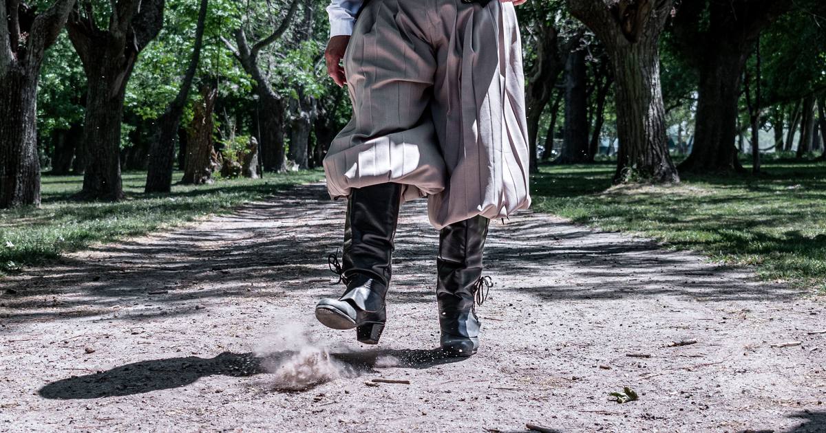 A gaucho in traditional dress on a dusty path at Chascomus, Buenos Aires province, Argentina
