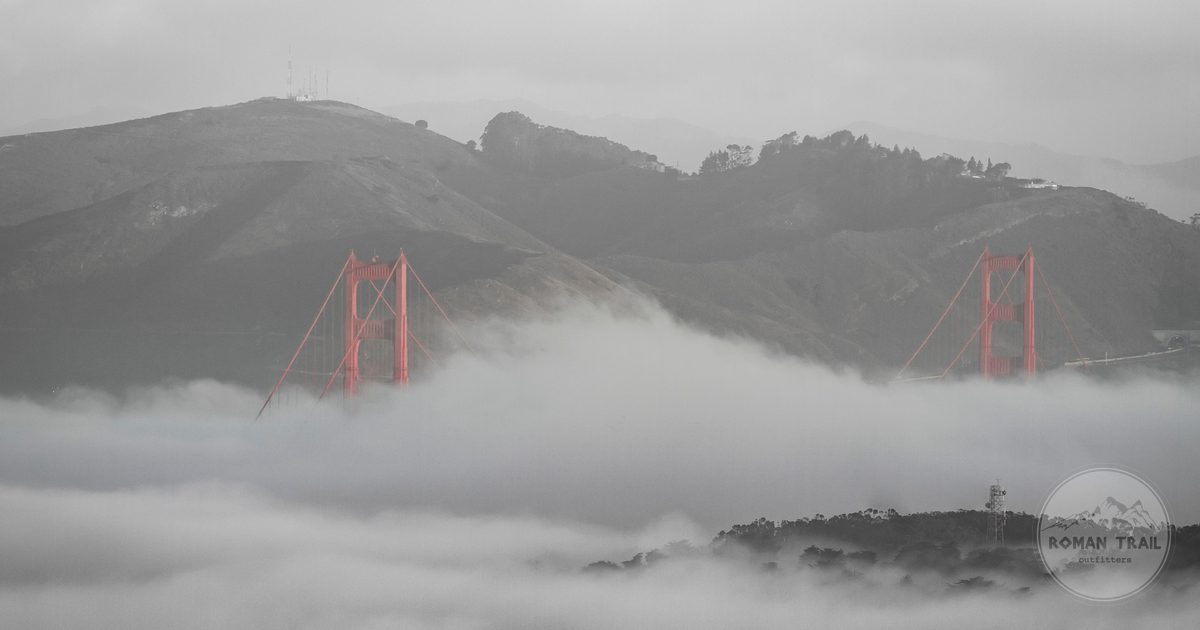 Golden Gate Bridge towers rising above the fog layer seen from the Marin Headlands, San Francisco for women travelers