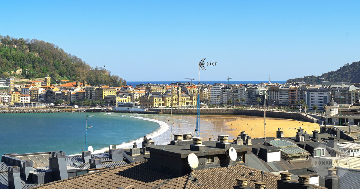 View over rooftops towards the beachfront of San Sebastian, Spain